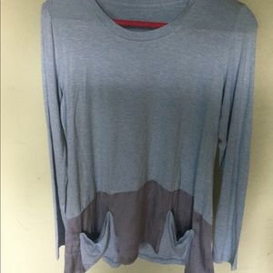 Logo by Lori Goldstein blue and Gray Top.